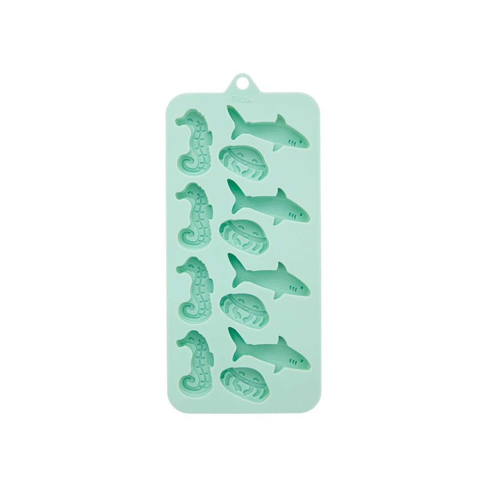 قالب حلوى ويلتون على شكل سمكة قرش وقنديل البحر وحصان البحر، 12 تجويفًا
